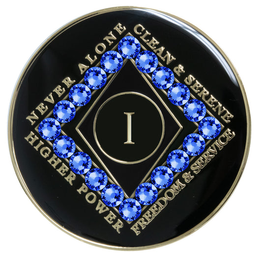 1 year black Onyx Clean time recovery medallion with a diamond shape within a diamond shape for a 3D effect, 20 Sapphire blue CZ genuine crystals form the outer diamond shape, never alone, clean & serene, Higher Power, freedom & service in 14k gold-plated brass, sealed with resin for a glossy finish that will last and is scratch proof.
