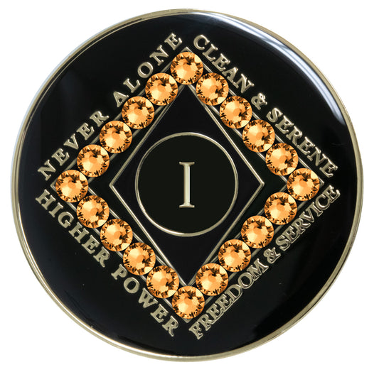 1 year black Onyx Clean time recovery medallion with a diamond shape within a diamond shape for a 3D effect, 20 gold Topaz CZ genuine crystals form the outer diamond shape, never alone, clean & serene, Higher Power, freedom & service in 14k gold-plated brass, sealed with resin for a glossy finish that will last and is scratch proof.