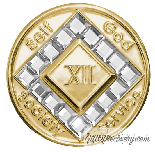 12 year gold plated NA medallion with self, God, Society, and Service around the outer rim of the diamond, 16 square diamond CZ genuine crystals that form the diamond around the roman numeral.