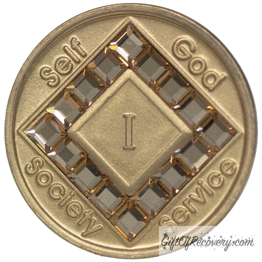 1 year bronze NA medallion with self, God, Society, and Service around the outer rim of the diamond, 16 diamond shaped CZ genuine Colorado Topaz crystals, that form the diamond around the roman numeral.