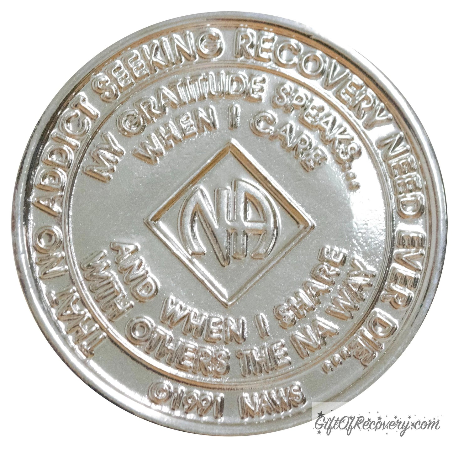 Back of NA nickel plated crystalized Emerald medallion has the NAWS official slogans and motto.