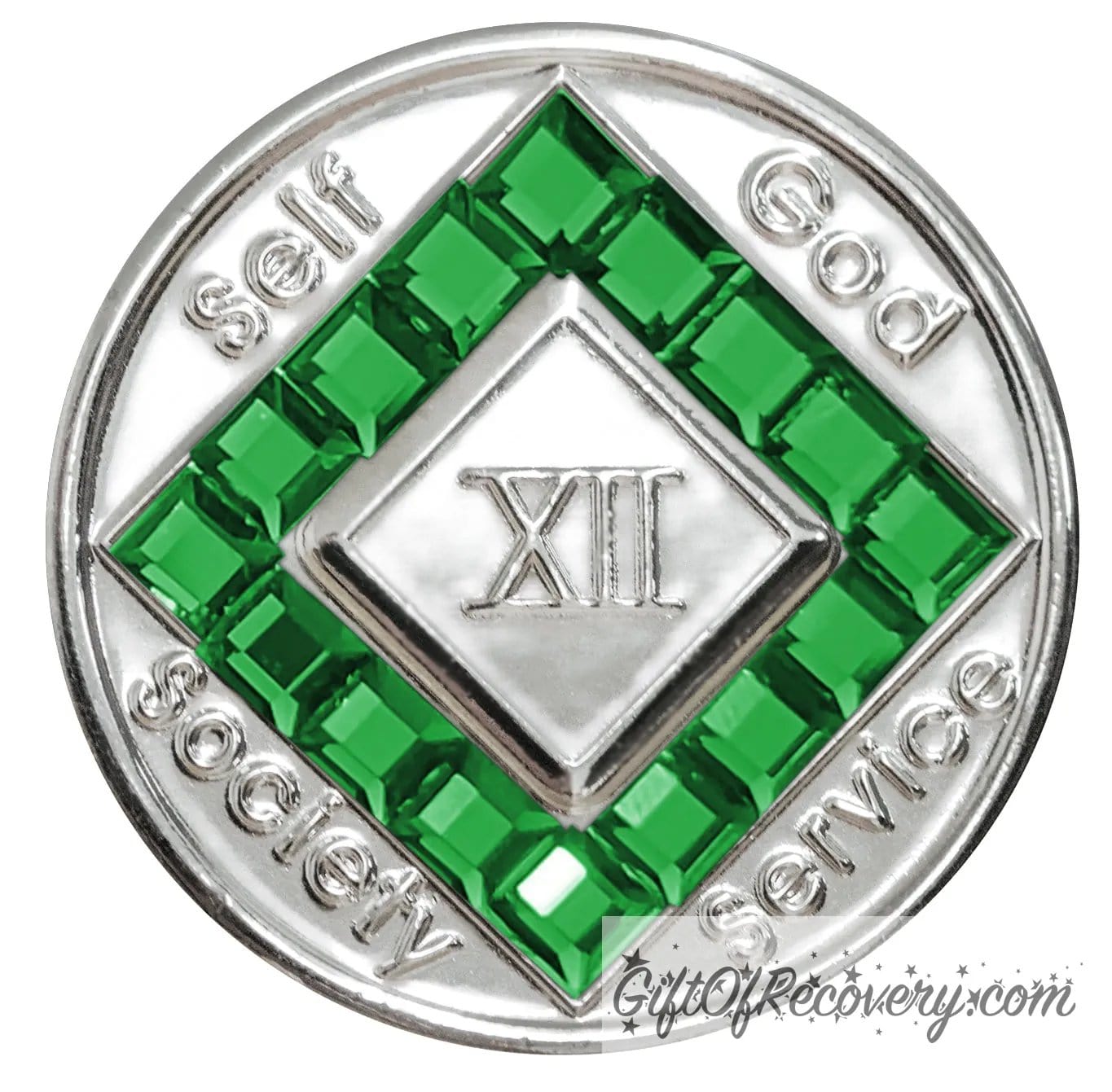 12 year nickel plated NA medallion with self, God, Society, and Service around the outer rim of the diamond, 16 square Emerald CZ genuine crystals that form the diamond around the roman numeral.
