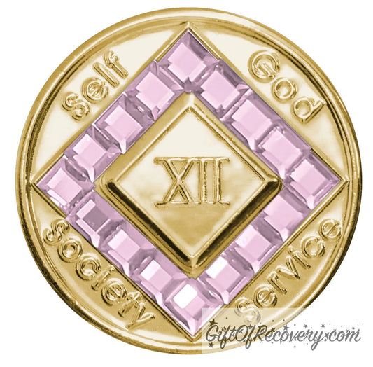 12 year gold plated NA medallion with self, God, Society, and Service around the outer rim of the diamond, 16 square light rose CZ genuine crystals that form the diamond around the roman numeral.