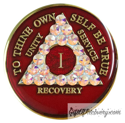 1 year AA medallion with 21 Aurora Borealis genuine crystals in the shape of the triangle and to thine own self be true, unity, service, recovery, and roman numeral are embossed with 14k gold-plated brass, the medallion is sealed with resin for a shiny finish that lasts.