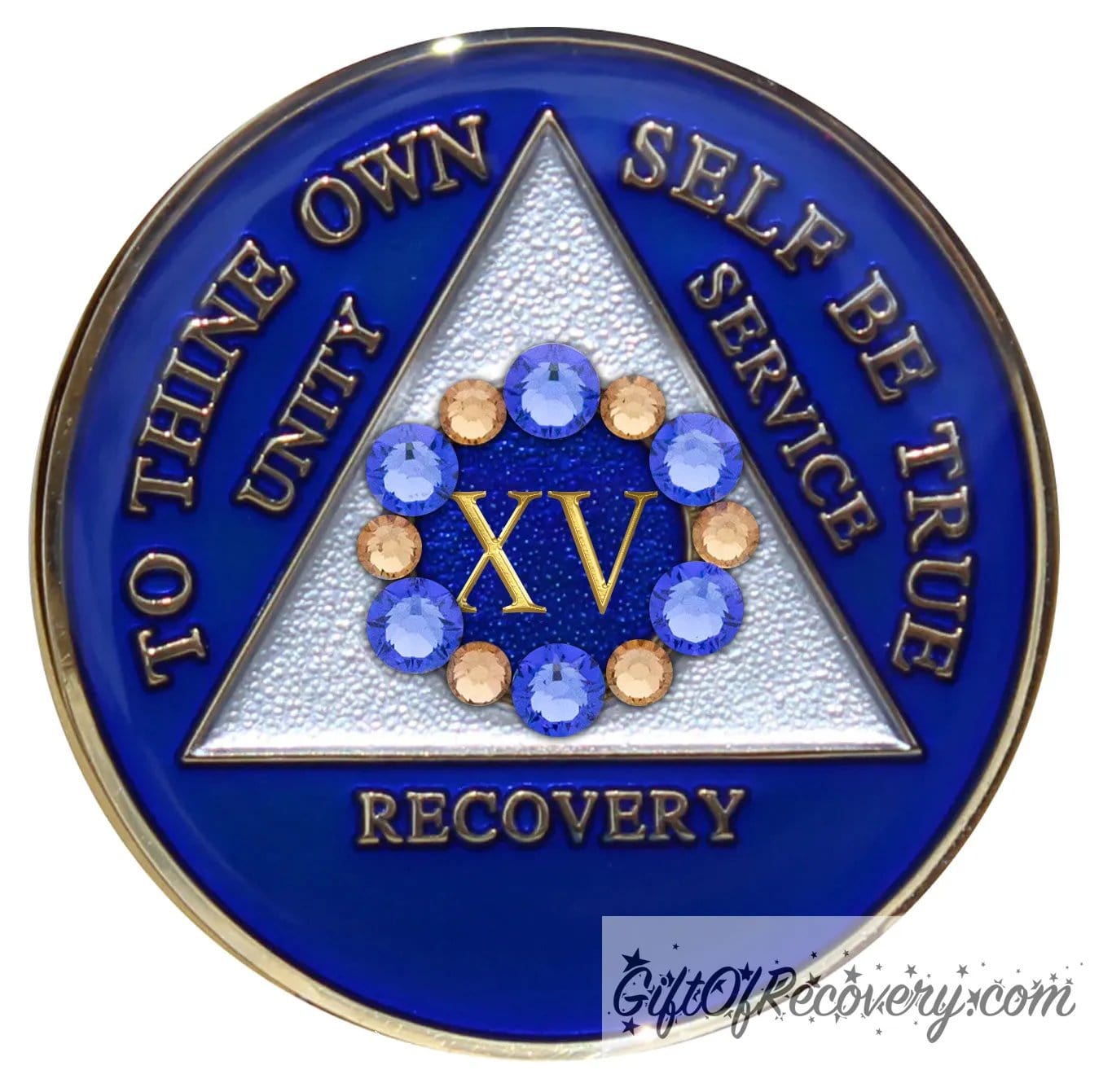15 year AA medallion Big Book blue with 6 genuine blue crystals and 6 gold in a circle around the roman numeral like a flower symbolizing the 12 steps and growth in recovery, the triangle is pearl white, AA slogan and three legacies are embossed 14k gold-plated brass, sealed with resin for a shiny finish.