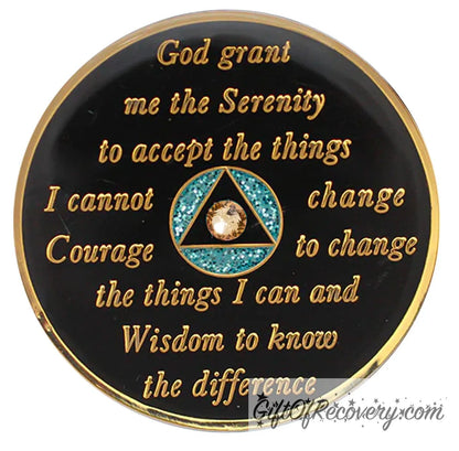 Back of Aqua glitter AA medallion is black onyx, with the circle aqua glitter and the triangle black, the center of the triangle has a single gold genuine crystal, and the serenity prayer is in 14k gold plated brass, the recovery medallion is sealed with resin for a shinny finish.