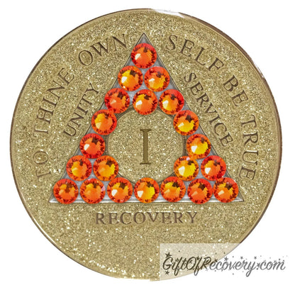 1 year Gold glitter AA medallion with twenty-one fire opal genuine crystals in the shape of a triangle, to thine own self be true, unity, service, recovery embossed in 14k gold-plated brass along with the rim of the medallion, sealed in a high-quality, chip and scratch-resistant resin dome giving it a beautiful glossy look that will last.