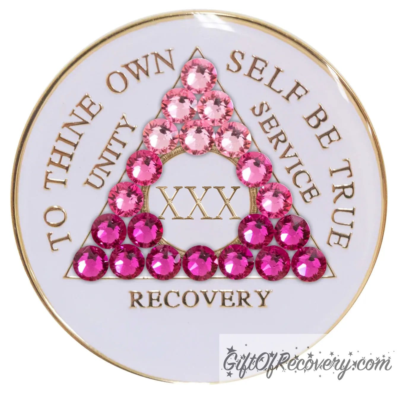 30 year pearl white AA medallion with 21 genuine crystals in the shape of the triangle and ranging from light to dark pink, representing the transformation of your sobriety journey, the AA moto along with the roman numeral and rim of medallion are 14k gold plated brass and sealed with resin for a glossy finish.