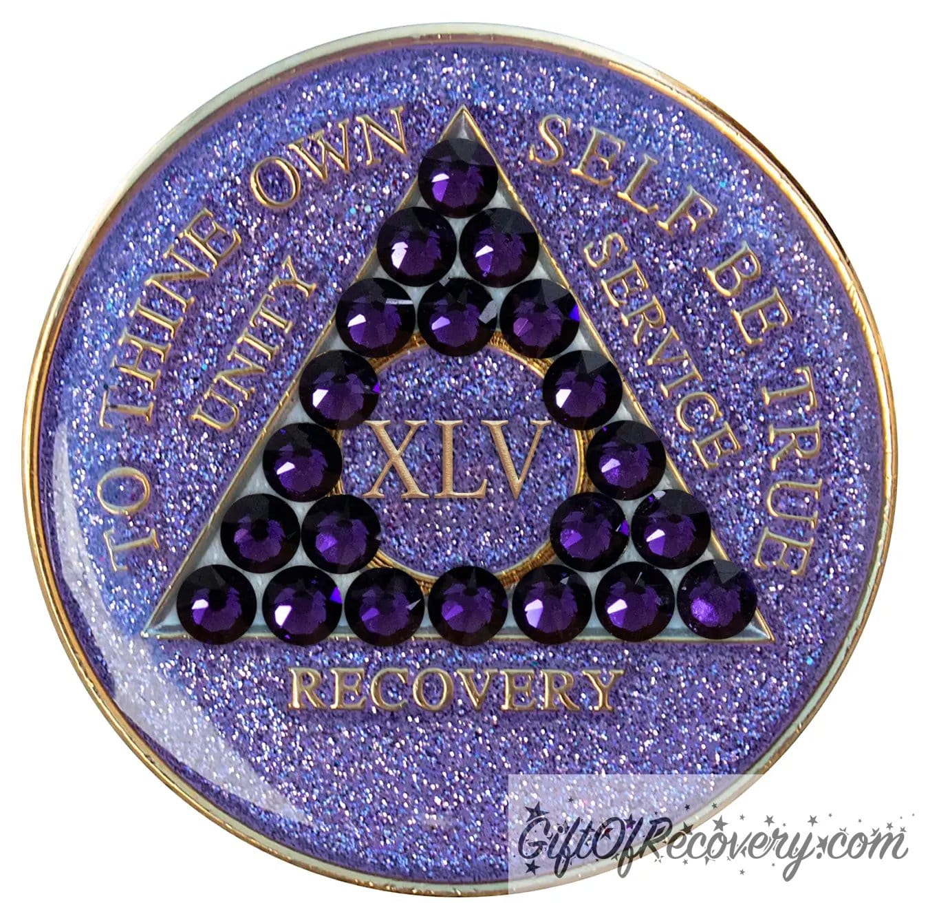 45 year glitter purple AA medallion with 21 purple velvet genuine crystals, that create the triangle in middle, and to thine own self be true, unity, service, recovery, the roman numeral in the center of the circle triangle, along with the rim of the recovery medallion, are embossed in 14 gold plated brass, sealed in resin for glossy finish.