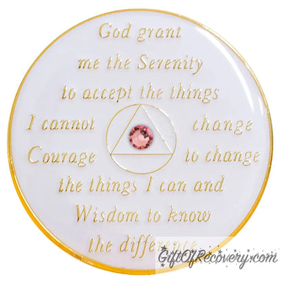 Back of Pearl white AA medallion, the recovery medallion is all white with the serenity prayer and circle triangle embossed with 14k gold-plated brass, inside the triangle is a single pink rose genuine crystal, the medallion is sealed with resin for a shiny finish.