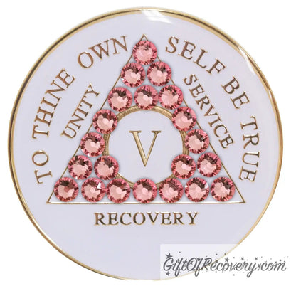 5 year pearl white AA medallion with Twenty-one genuine rose crystals in the shape of the triangle, unity, service, recovery, roman numeral, and to thine own self be true, embossed in 14k gold-plated brass and sealed with resin for a glossy finish that is scratch proof and will last.