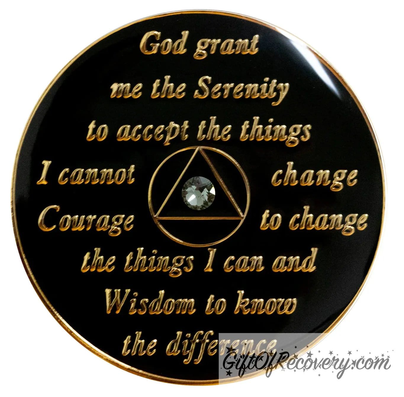 Back of AA recovery medallion is black and has the raised serenity prayer, outer rim, and the circle triangle in the center in 14k gold plated brass, inside the black triangle is 1 grey genuine crystal, and sealed with resin for a glossy finish.