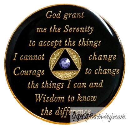 Back of gold glitter unity AA recovery medallion is black and has the serenity prayer, outer rim, and the circle triangle in the center embossed with 14k gold-plated brass, the circle is gold glitter and triangle is black with one single purple genuine crystal in the center of the triangle, the recovery medallion is sealed with resin for a shiny finish. 