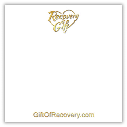 White 3x3 card with Recovery is a gift going through a heart at the top center and giftofrecovery.com at the bottom center, all writing is in the color gold.