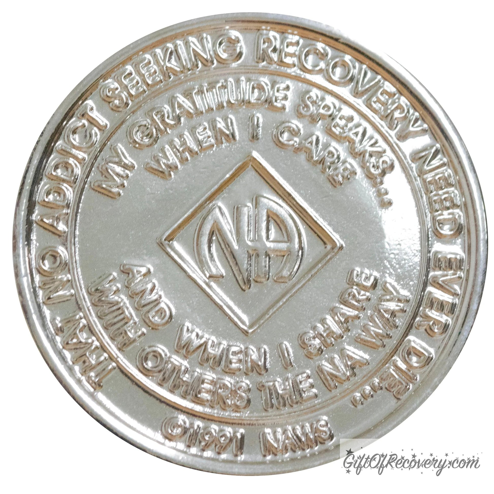 Back of NA nickel plated crystalized Emerald medallion has the NAWS official slogans and motto. 