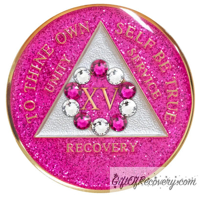 15 Year princess pink glitter 10th step AA medallion with 5 pink genuine crystals and 5 clear genuine crystal, formed in a circle around the year, to thine own self be true, triangle in the center and unity, service, recovery, along with rim of medallion are slightly raised in 14k gold, the center of the triangle is pearl white with the circle being pink glitter, all emphasizing action and reflection, for your favorite sober princess.