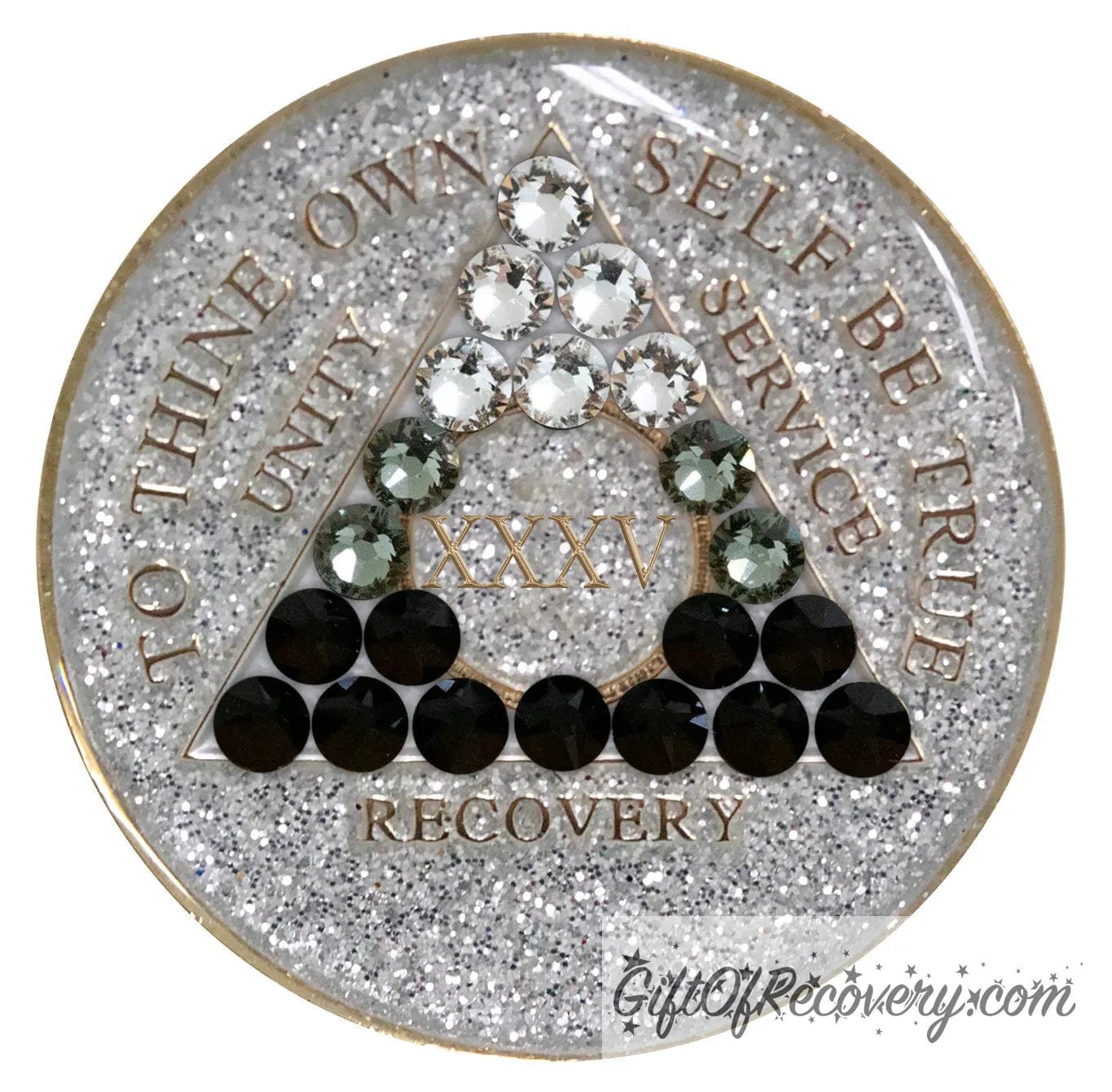 35 year Silver glitter AA transition medallion with twenty-one genuine crystal going from dark to light, which symbolizes growth in recovery, recovery medallion moto's are embossed with 14k gold-plated brass, sealed in a high-quality, chip and scratch-resistant resin dome giving it a beautiful glossy look that will last.