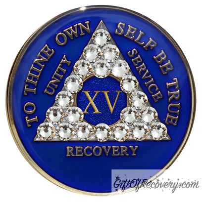 15 year AA medallion Big Book Blue with 21 genuine diamond CZ crystals to form the triangle and emphasize strength under pressure that is built in the program, AA slogan and three legacies are embossed 14k gold-plated brass, recovery medallion is sealed with resin for a shiny finish.