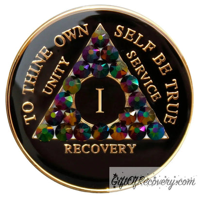 1 year black onyx AA recovery medallion, with 21 genuine peacock crystals, symbolizing the beauty and diversity of recovery journeys, the AA medallion has; to thine own self be true, unity, service, recovery, roman numeral, and the rim, embossed with 14k gold and sealed with resin for a glossy finish.