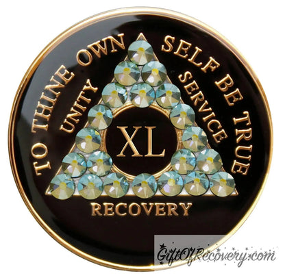 40 year AA medallion Black onyx, with 21 genuine Peridot AB crystals in the shape of the triangle, to thine own self be true, unity, service, recovery, and the roman numeral, are embossed with 14k gold-plated brass, the recovery medallion is sealed with resin for a glossy finish that lasts and is scratch proof.