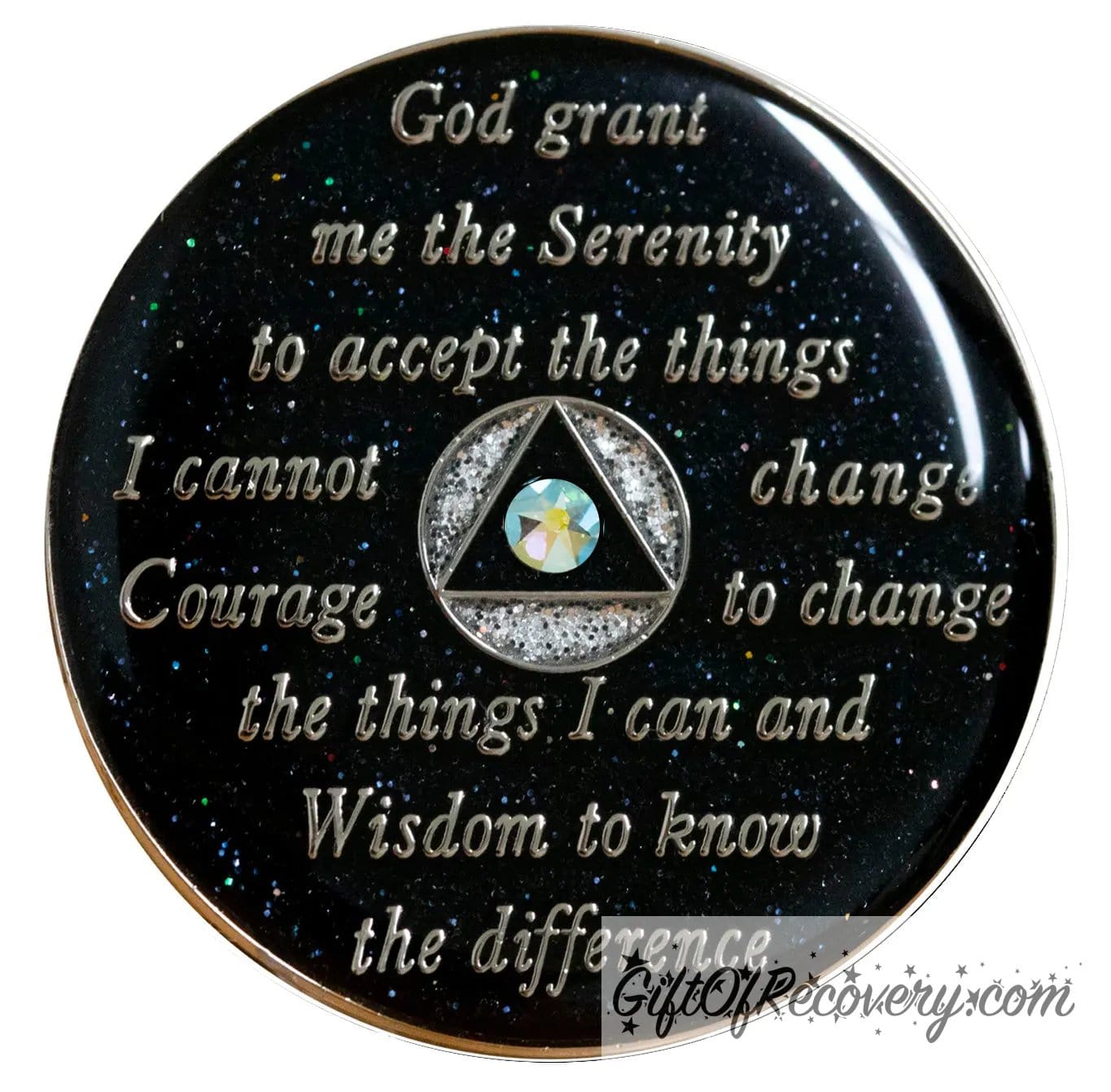 Back of zebra glitter AA recovery medallion is black glitter onyx and has the serenity prayer, outer rim, and the circle triangle in the center silver-plated brass, the circle is silver glitter and triangle is black with one single peridot AB genuine crystal in the center of the triangle, the recovery medallion is sealed with resin for a shiny finish. 